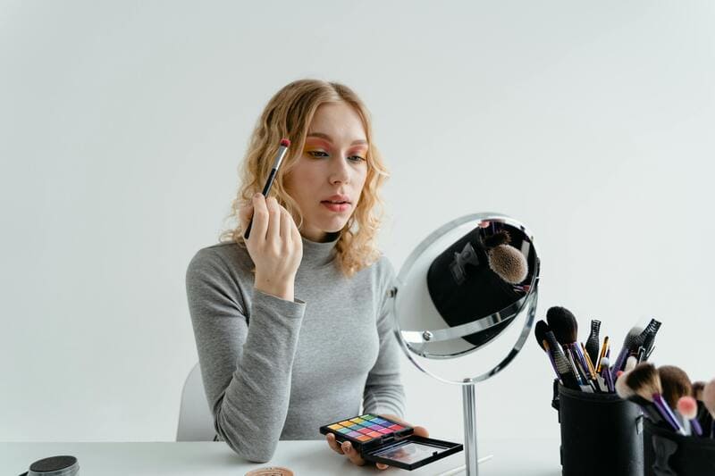 Applying makeup for a natural glam