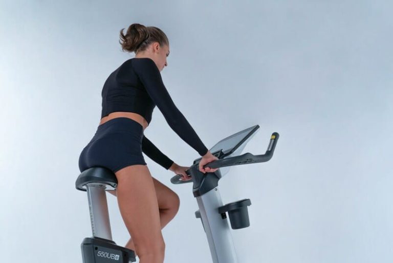 Motivation, courtesy of https://unsplash.com/photos/a-woman-is-riding-a-stationary-exercise-bike-Tn66BxkXteo