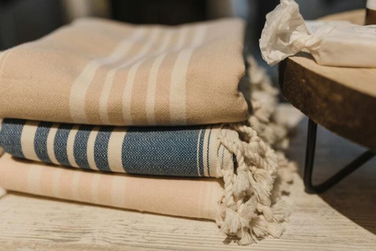 linens courtesy of https://www.pexels.com/photo/stack-of-blankets-placed-on-wooden-table-5424905/