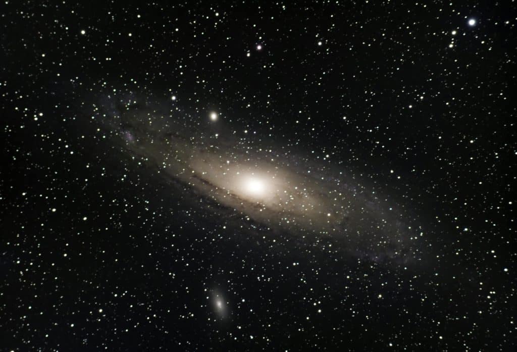Stunning view of the Andromeda Galaxy surrounded by countless stars in outer space. sagittarius, planetary influences