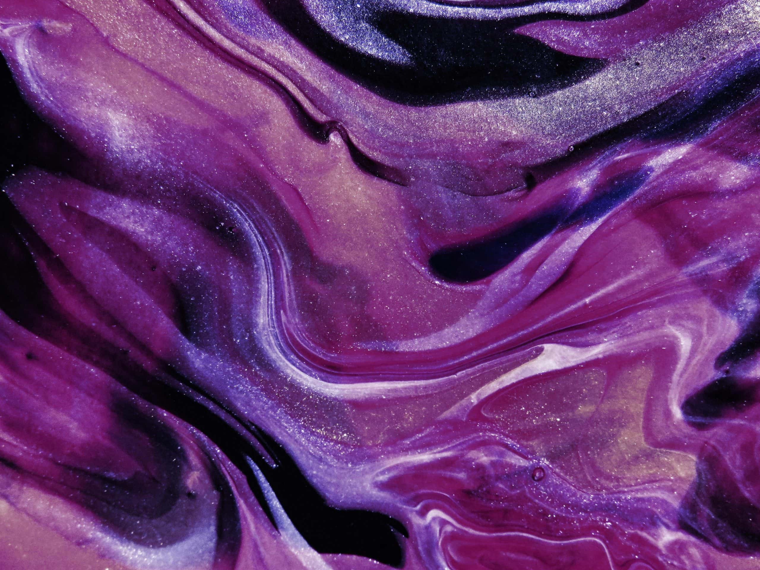 This photograph has a vivid swirl of purple. Vivid colors can be features of Art Deco glass.