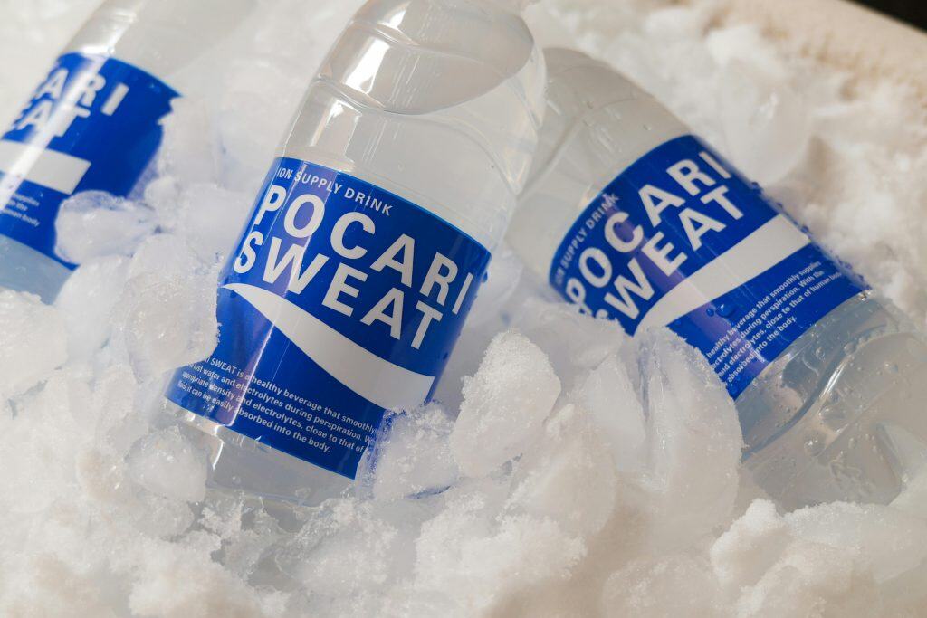 Chilled Pocari Sweat bottles resting in ice, showcasing hydration and refreshment, electrolytes, hydration