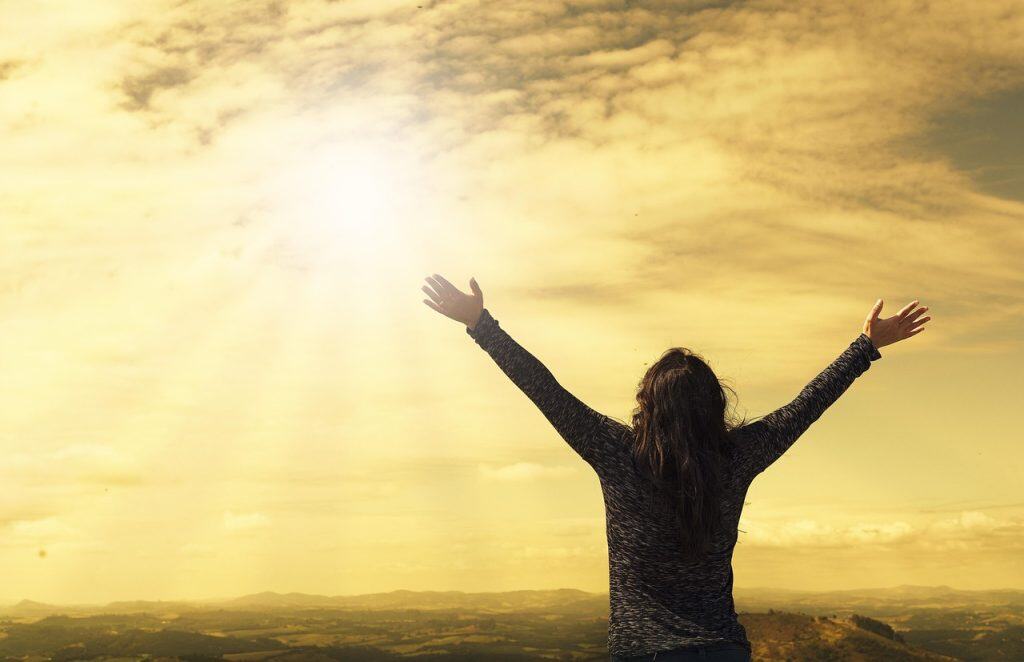woman, sky, nature, sunlight, arms, open arms, sunbeams, sunrays, clouds, worship, freedom, happiness, relieved, prayer, praise, success, joy, daily devotion